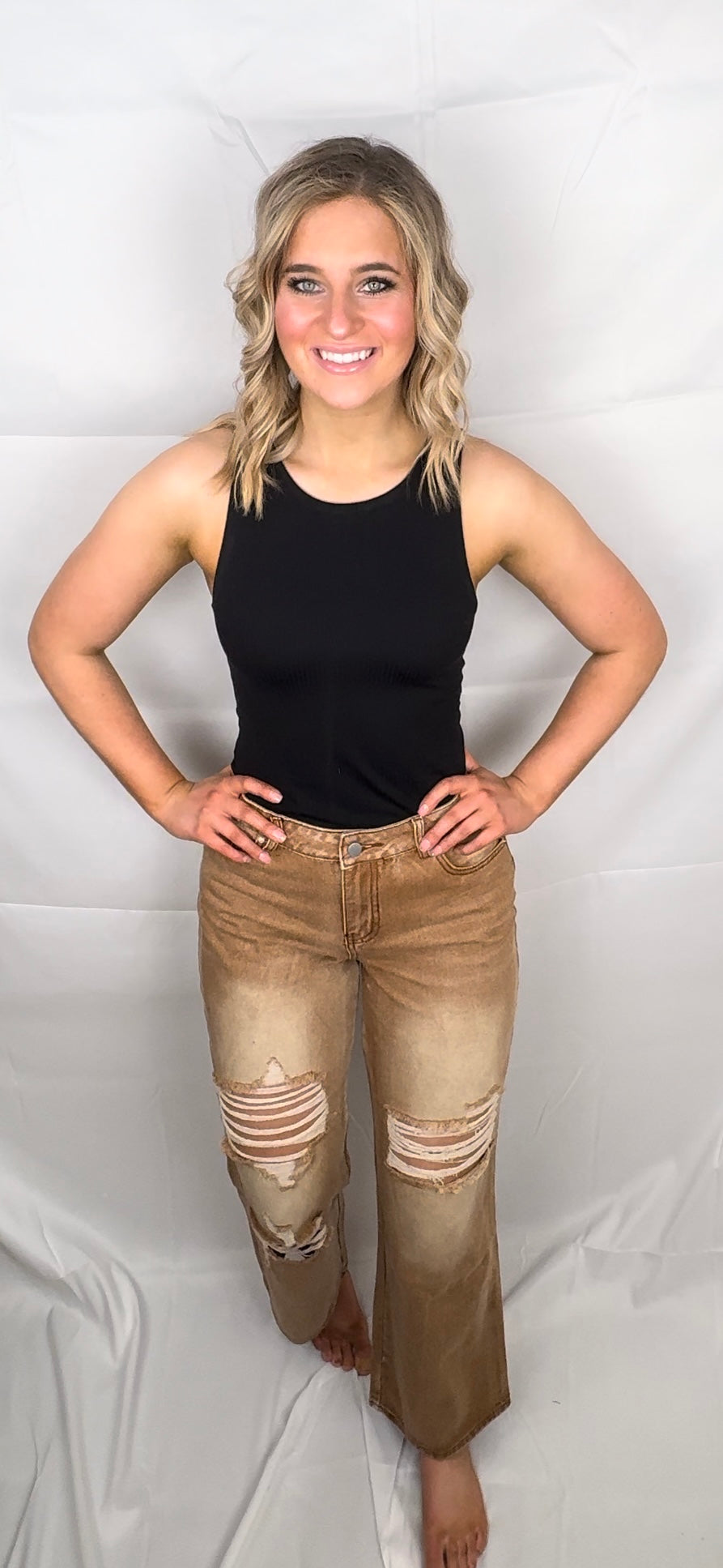 DISTRESSED DENIM JEANS